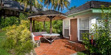 Superior cottage patio seating at East Winds, St Lucia